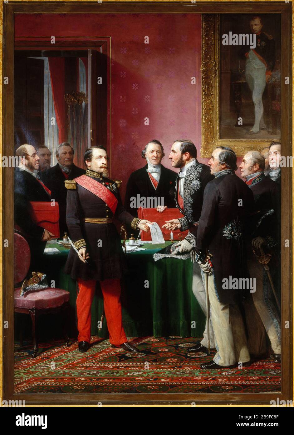 NAPOLEONE III CHE PRESENTA IL BARONE HAUSSMANN DECRETO ANNESSIONE CONFINE COMUNE ADOLPHE YVON (1817-1893). « Napoléon III remettant au baron Haussmann le décret d'annexion des communes limitrophes (16 février 1859) ». Huile sur toile, 1865. Parigi, musée Carnavalet. Foto Stock