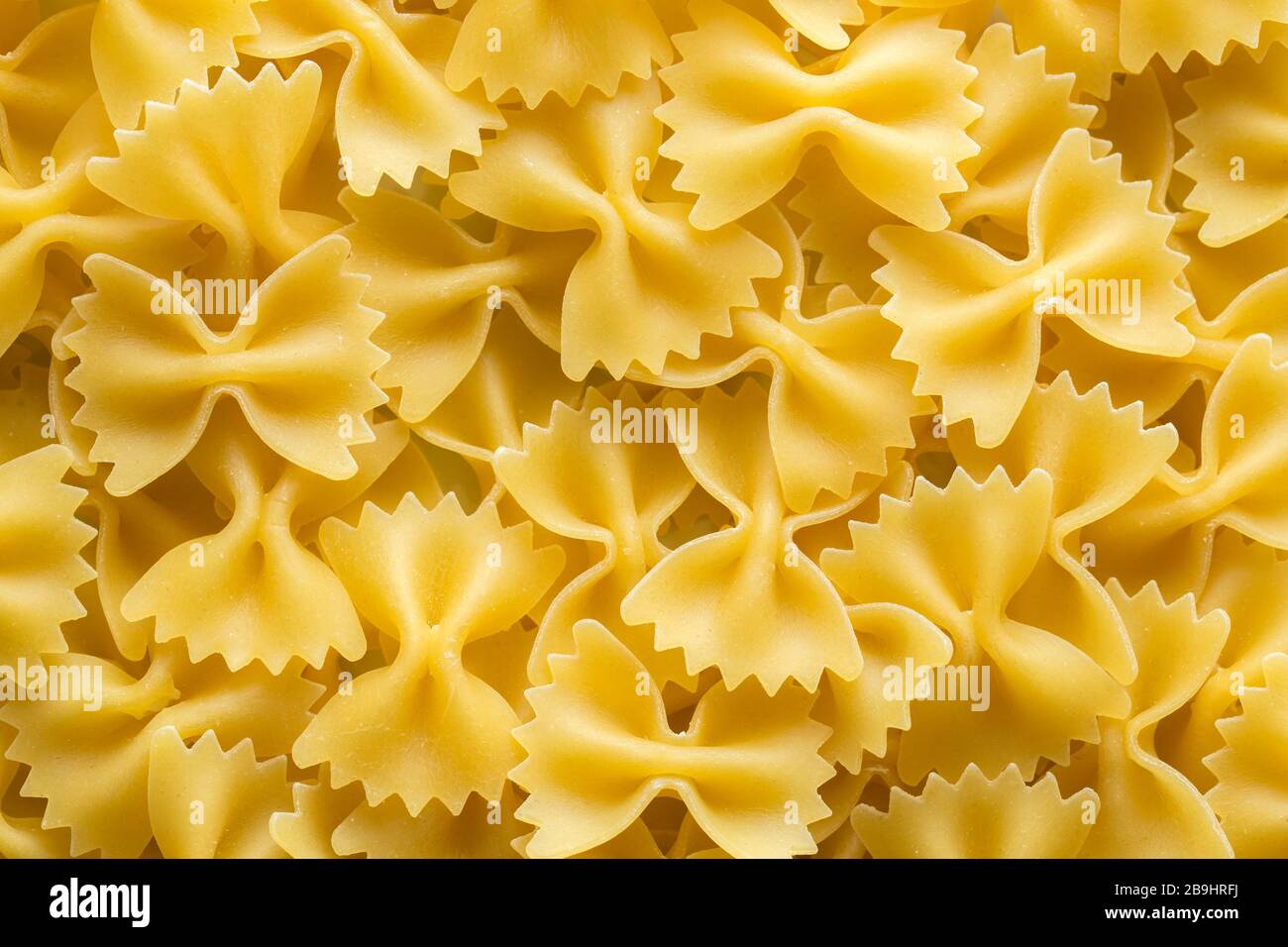 FARFALLE pasta italiana sfondo. Pasta tradizionale dall'alto Foto Stock