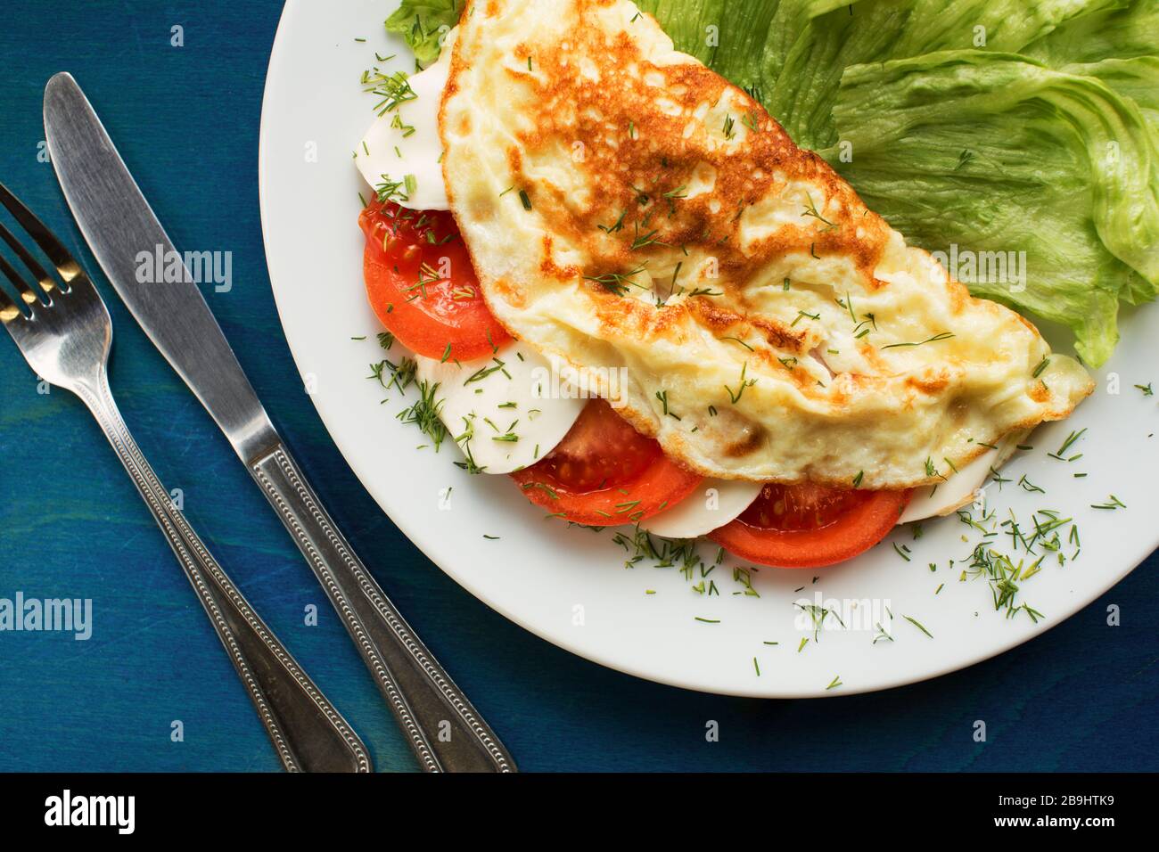 Frittata con pomodoro e mozzarella Foto Stock