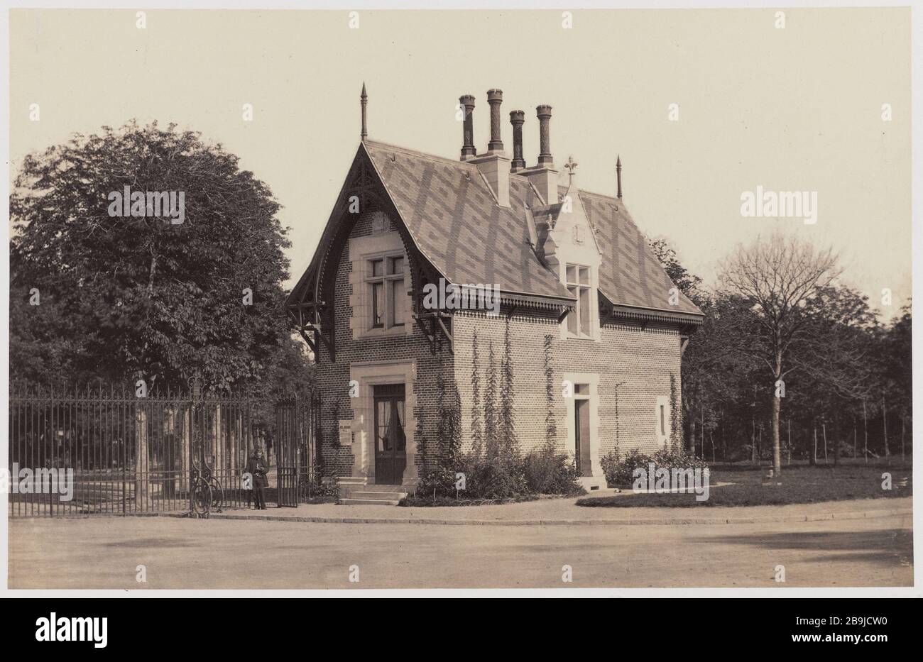 Watch House porta di Madrid, Bois de Boulogne, 16 ° distretto Maison de garde la porte de Madrid, bois de Boulogne, 16 ° arrondissement. Tirage sur papier albuminé à partir d'un négatif sur verre au collodion humide. 1858-1862. Photographie de Charles Marville (1813-1879). Parigi, musée Carnavalet. Foto Stock