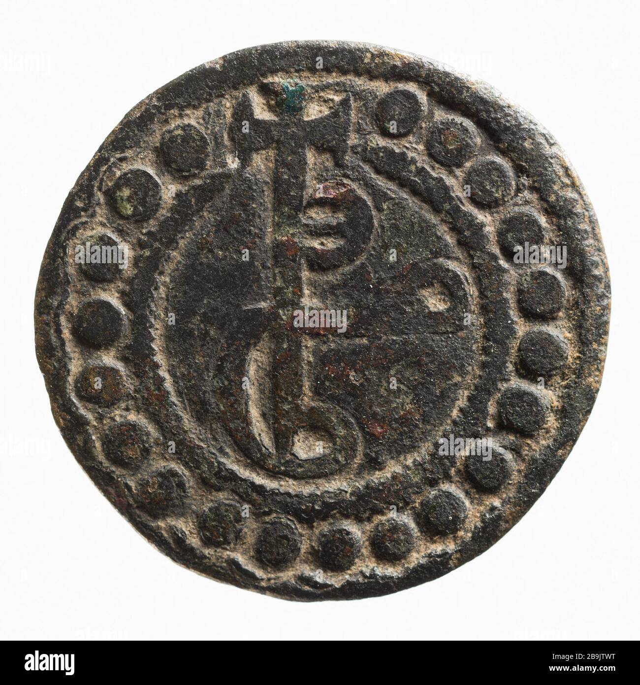 Conto simbolico Lombard, Anonyme del XIII-XV secolo. "Jeton de compte lombard, XIIIe-XVe siècle". Cuivre. 1200-1400. Parigi, musée Carnavalet. Foto Stock