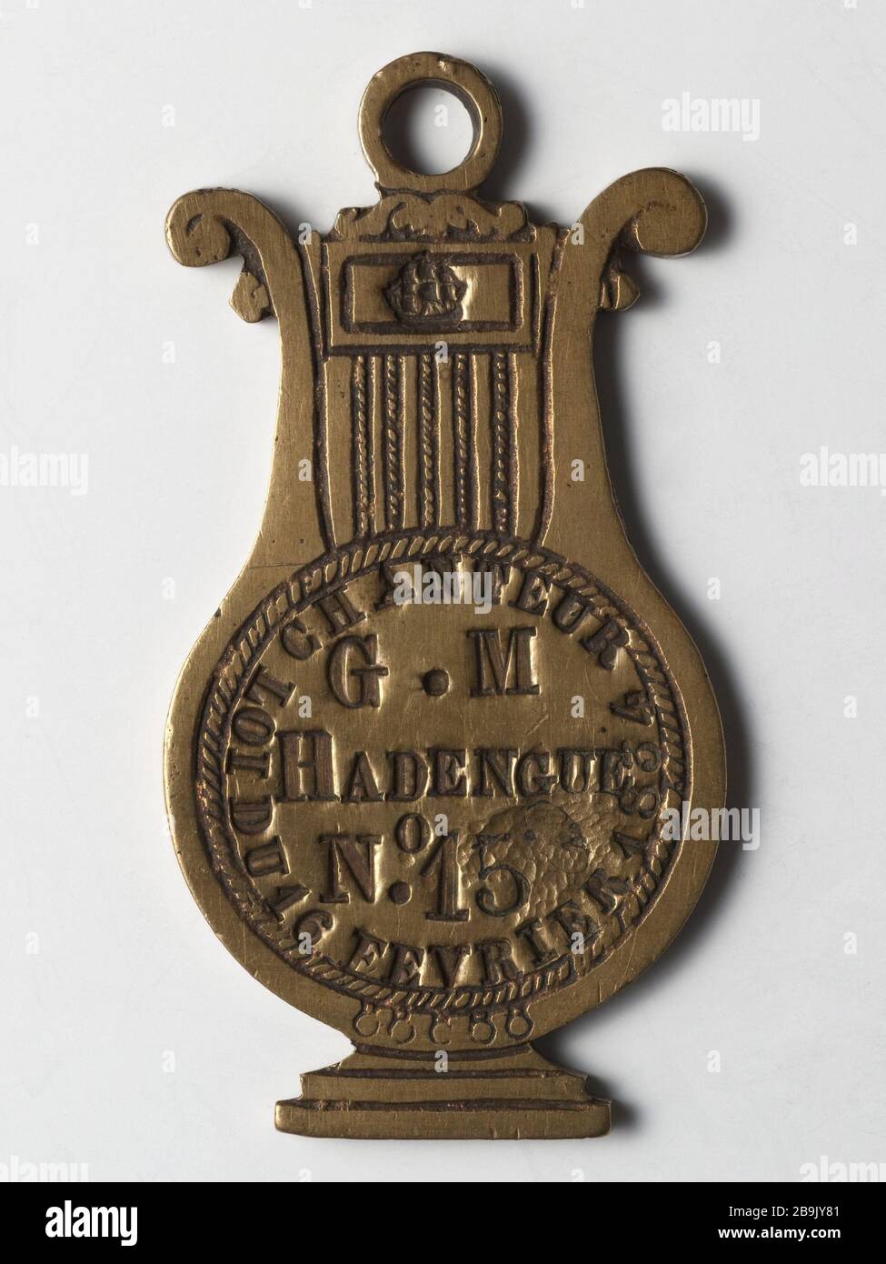 MEDAGLIA DEL CANTANTE G.M. 15 Anonyme (Préfecture de Police ?). Médaille du chanteur G. M. Hadengue, n° 15. Alluminio, rilievo, sbavatura. XIXème siècle. Parigi, musée Carnavalet. Foto Stock