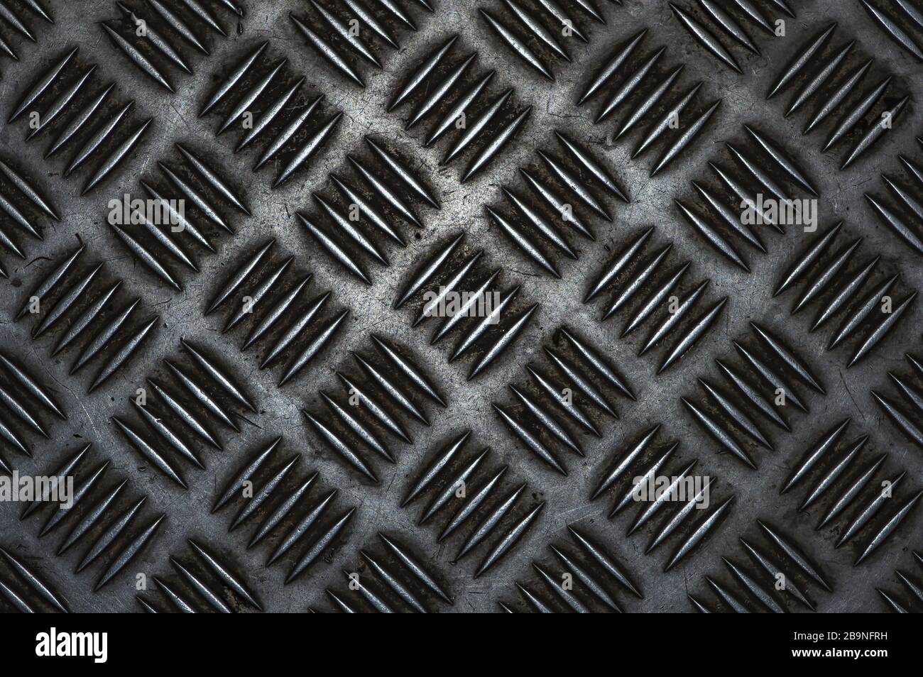 Pavimento in metallo con superficie corrugata in primo piano. Foglio di  alluminio corrugato, trama di fondo Foto stock - Alamy