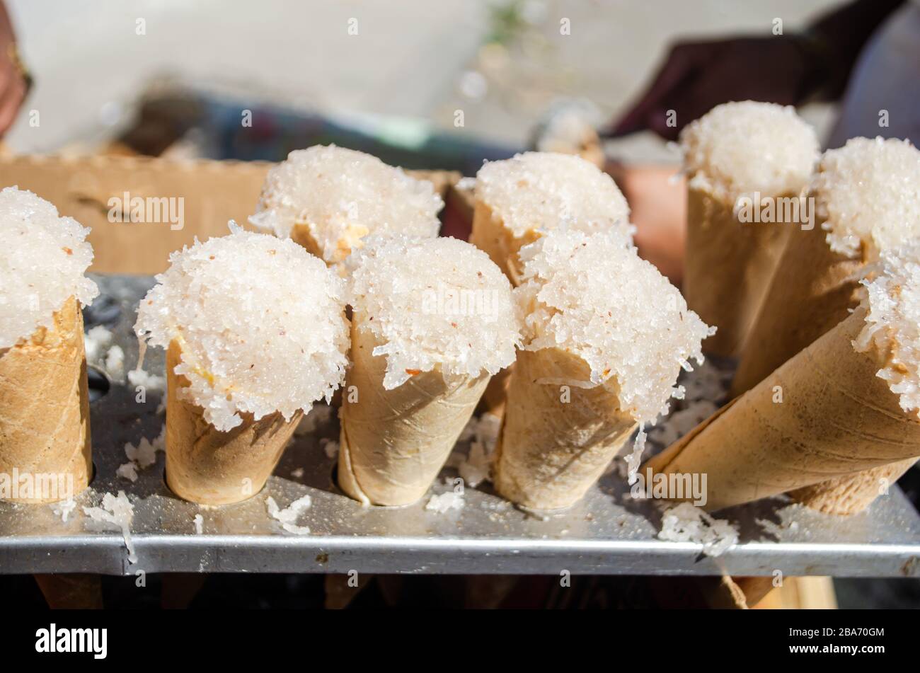 Dolci al cocco in vendita per le strade di l'Avana a Cuba Foto Stock