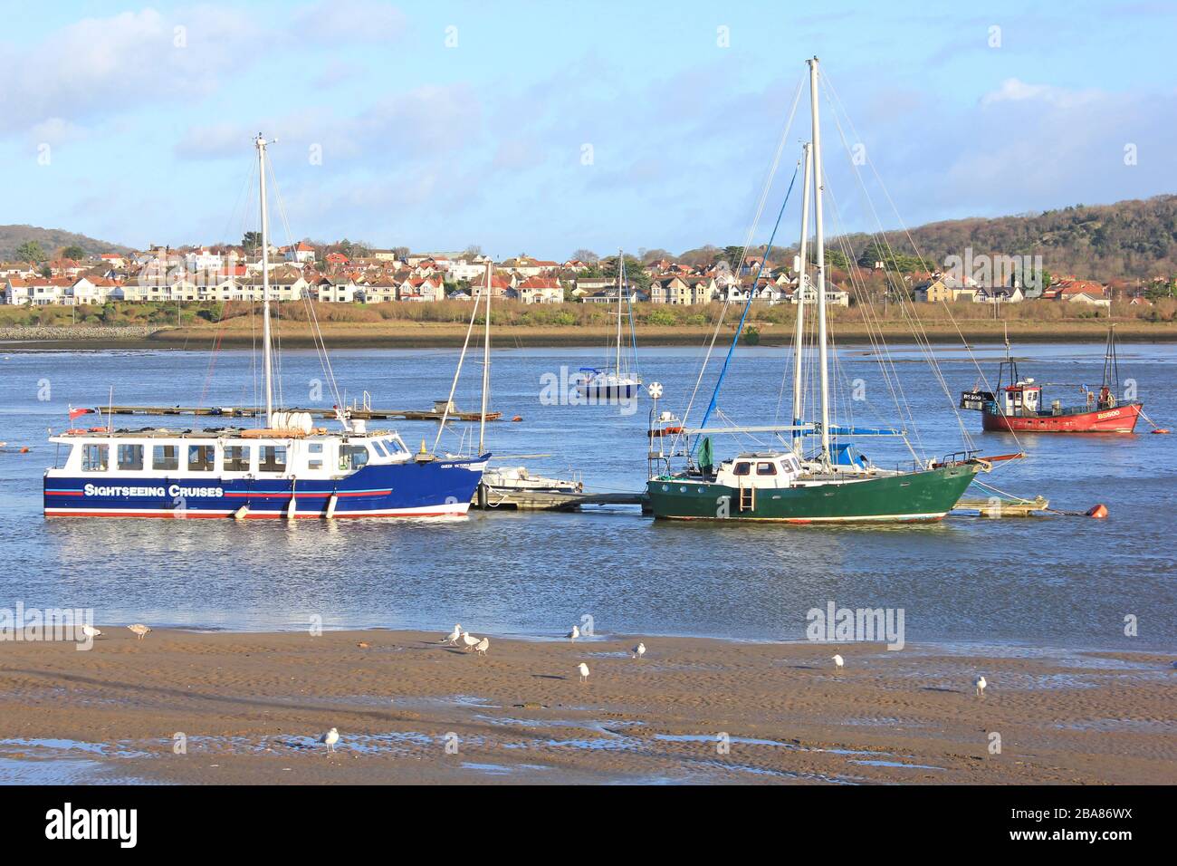 Barche a Conwy River Estuary, Galles del Nord Foto Stock