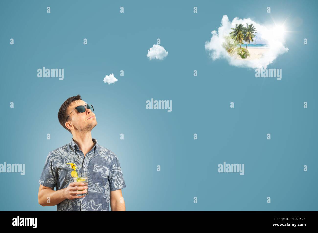 Uomo che pensa a una vacanza Foto Stock