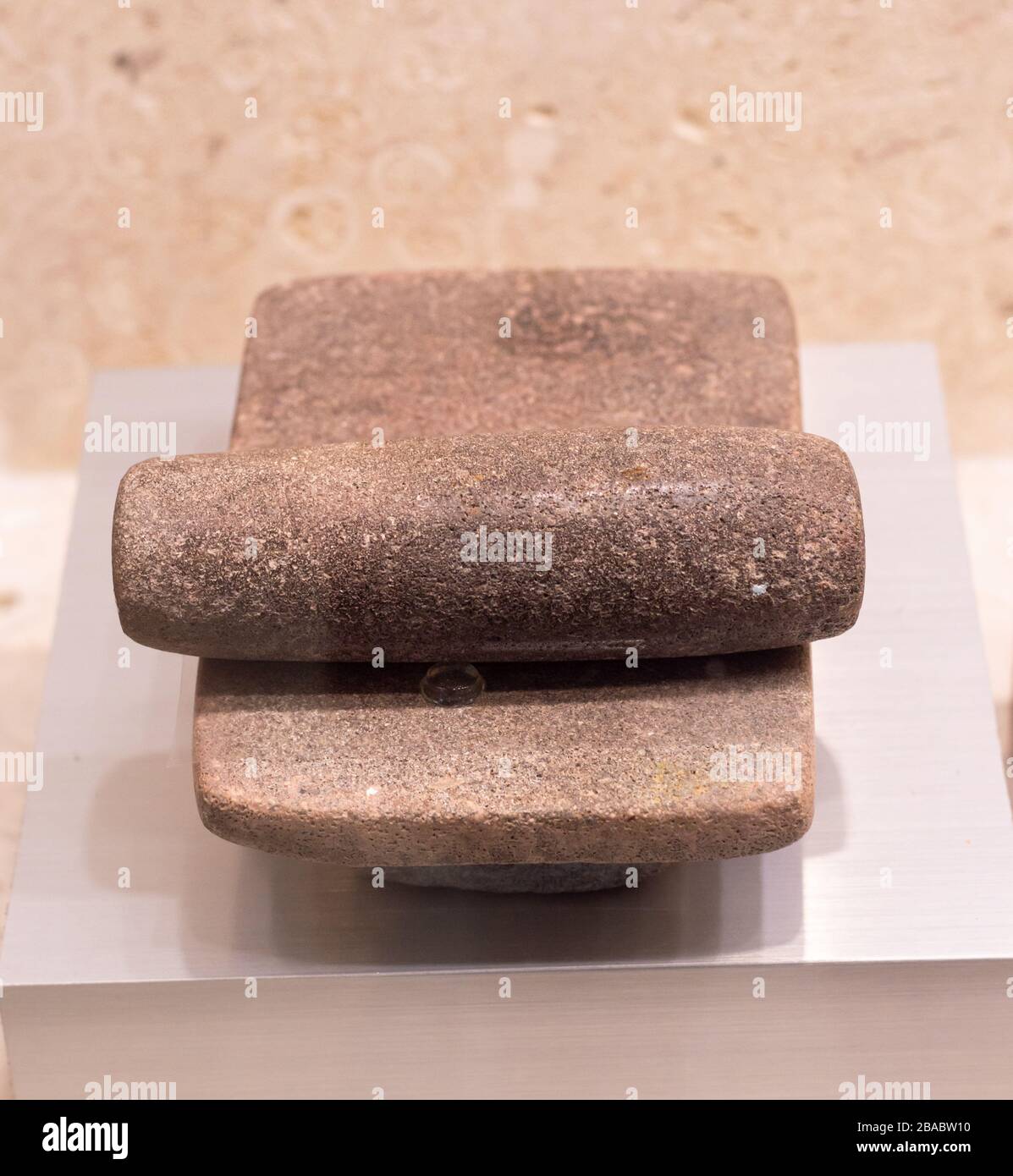 Pietra di macinatura maya, metato. Museo Maya, Merida, Yucatan, Messico Foto Stock