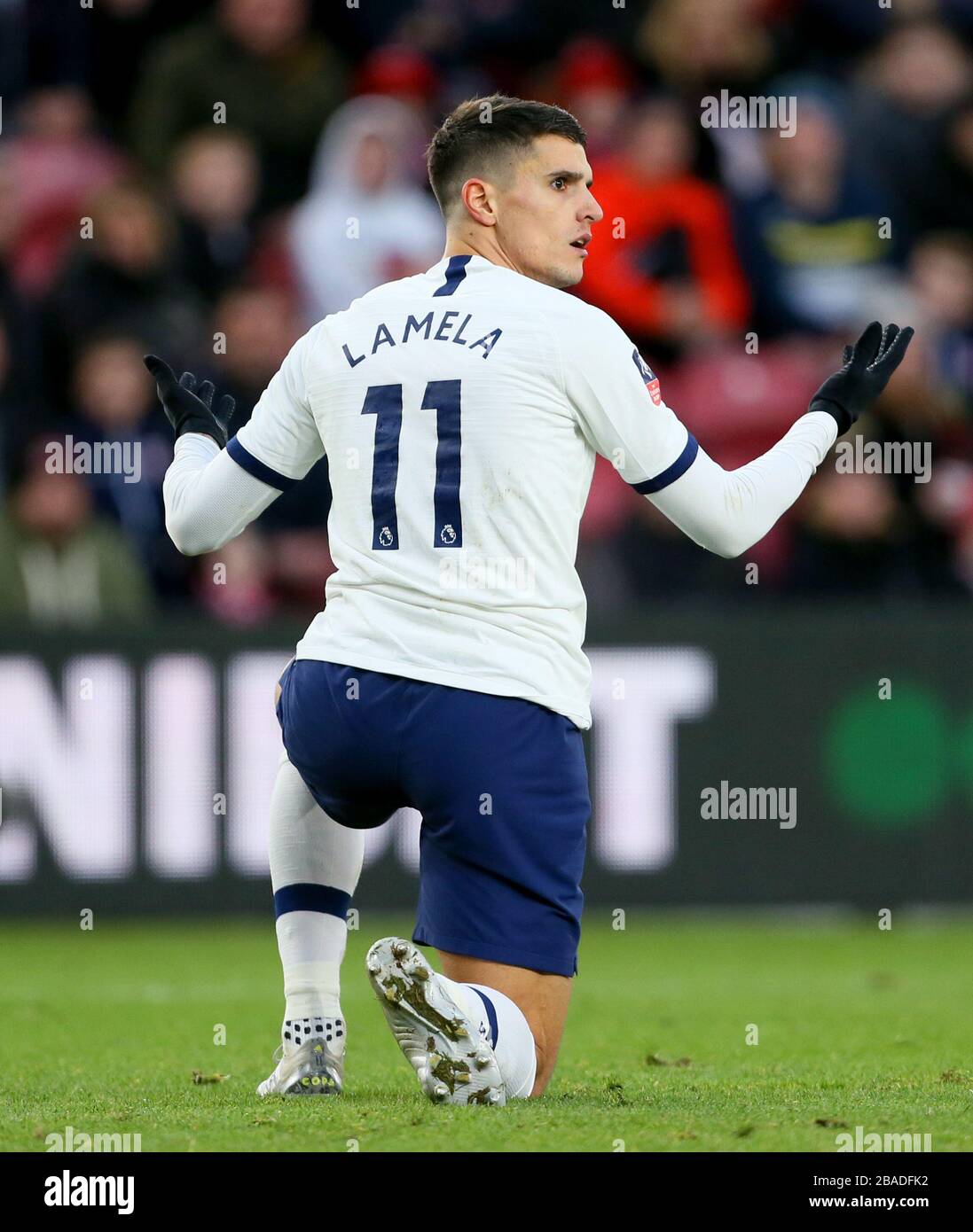 Erik lamela di Tottenham Hotspur in azione Foto Stock