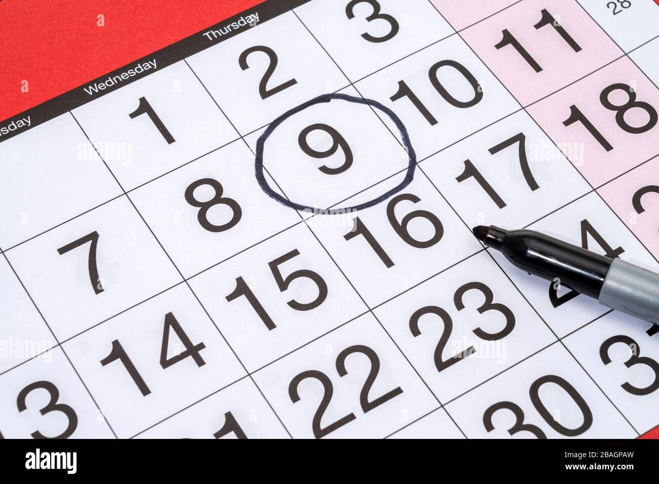 Un calendario con una data contrassegnata Foto Stock