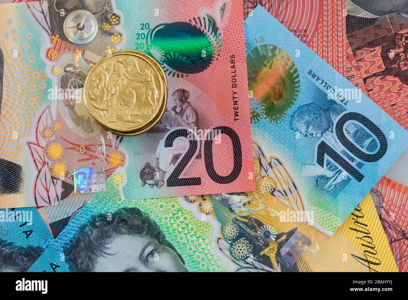 Closeup di denaro Australiano compresi dieci e venti banconote e una moneta da un dollaro. Foto Stock