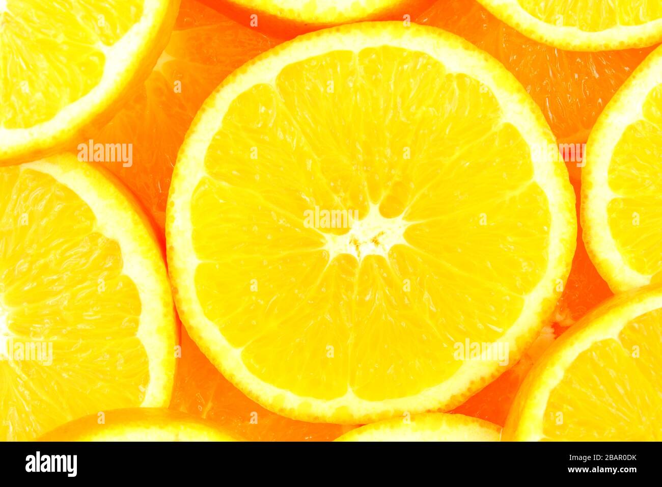 Fette di arancia fresca frutta come un alimento texture di sfondo Foto Stock