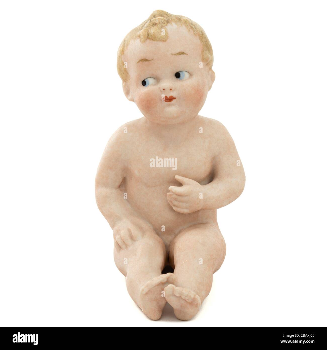 Baby doll vintage in ceramica, isolato su sfondo bianco Foto Stock