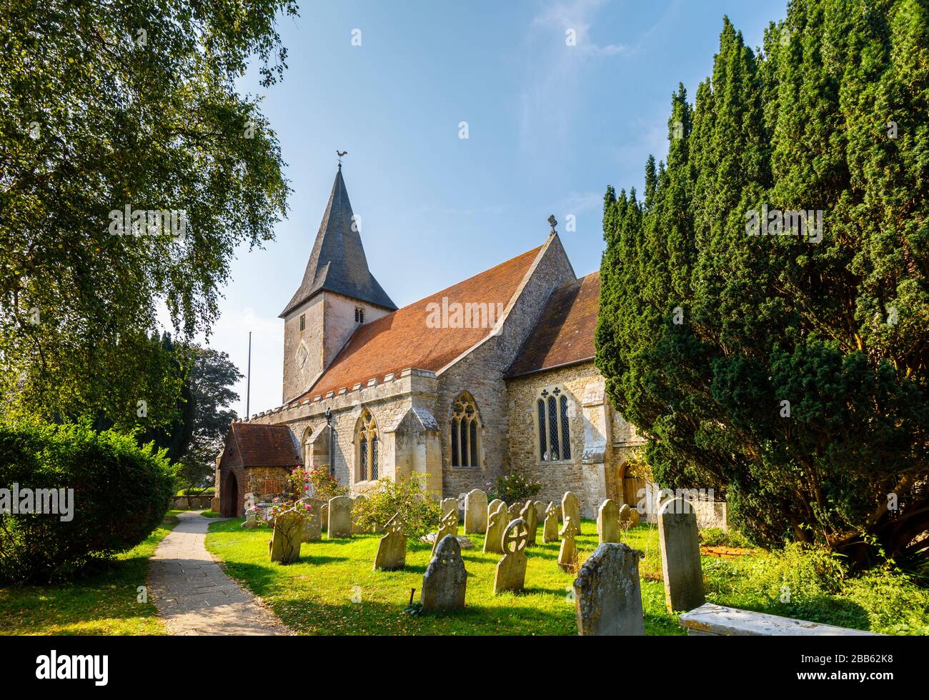 Holy Trinity Church, un edificio storico classificato di grado 1 a Bosham, un piccolo villaggio a Chichester Harbor, West Sussex, sulla costa meridionale dell'Inghilterra Foto Stock