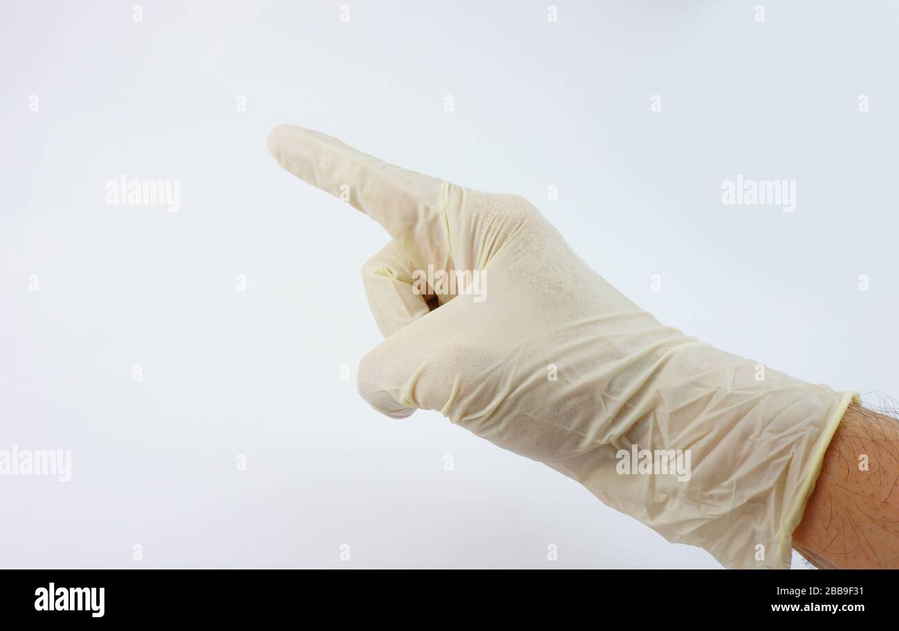 Guanti indossati dal medico per la serie di virus corona Foto Stock