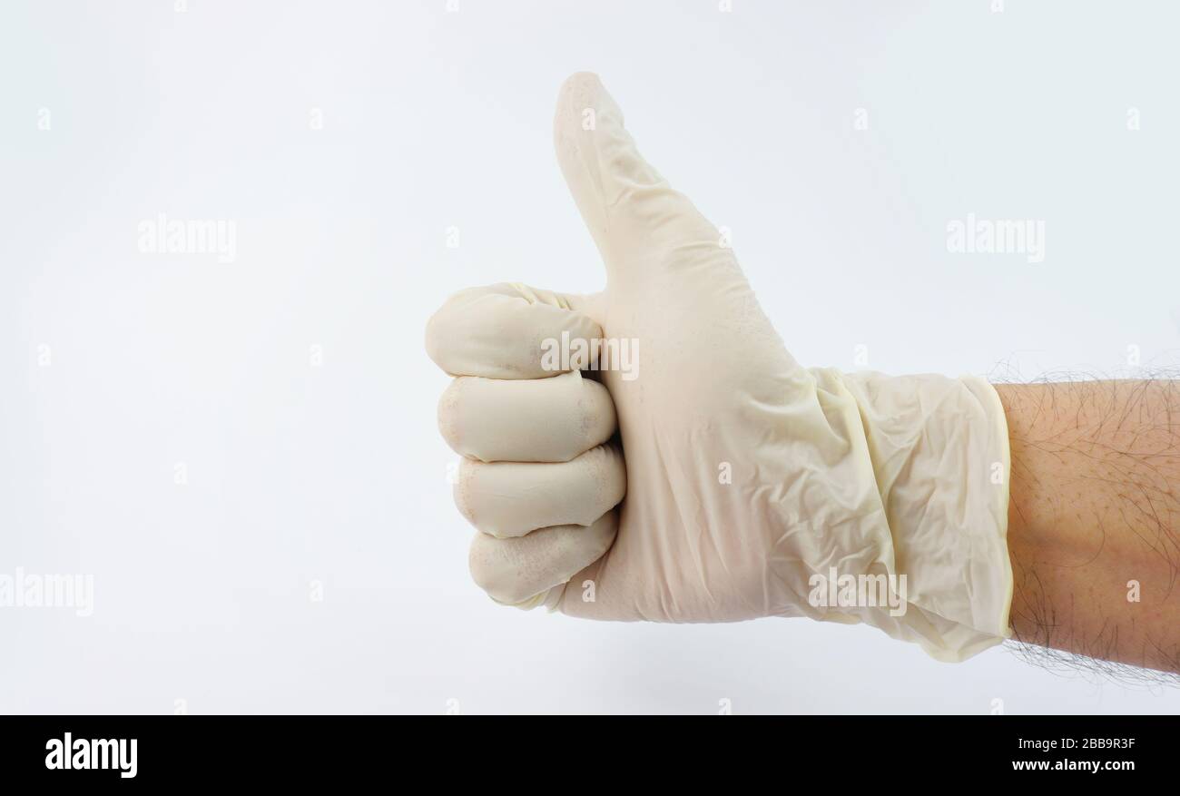 Guanti indossati dal medico per la serie di virus corona Foto Stock