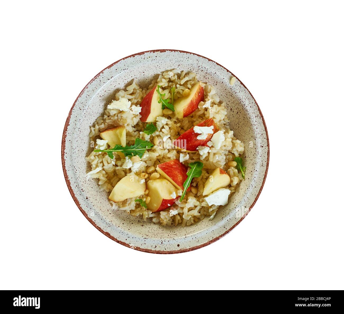Insalata di orzo perlato con mele, rucola e pinoli Foto Stock