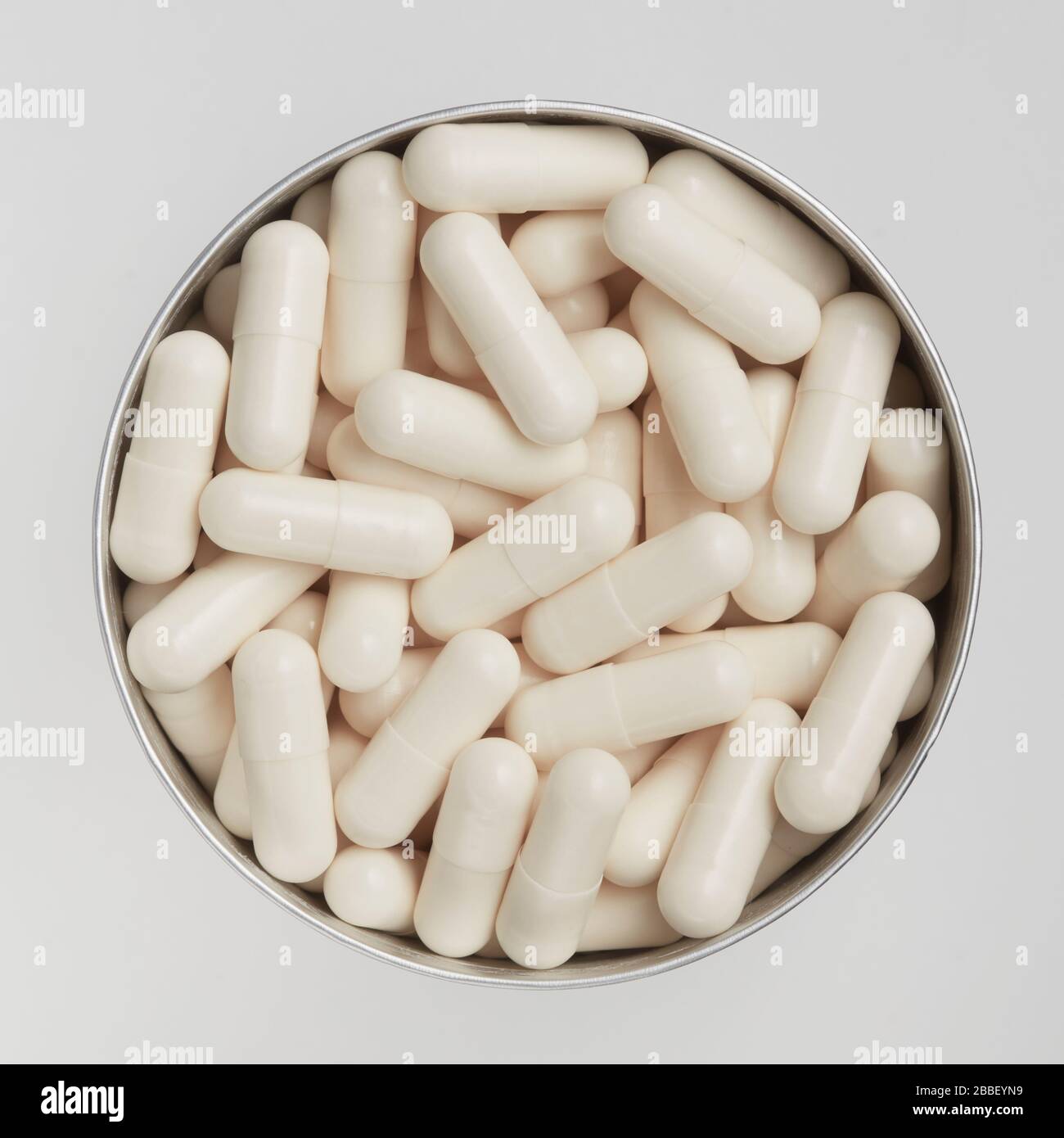 compresse supplementi medicina pillole rotondo gruppo contenitore tubo Foto Stock