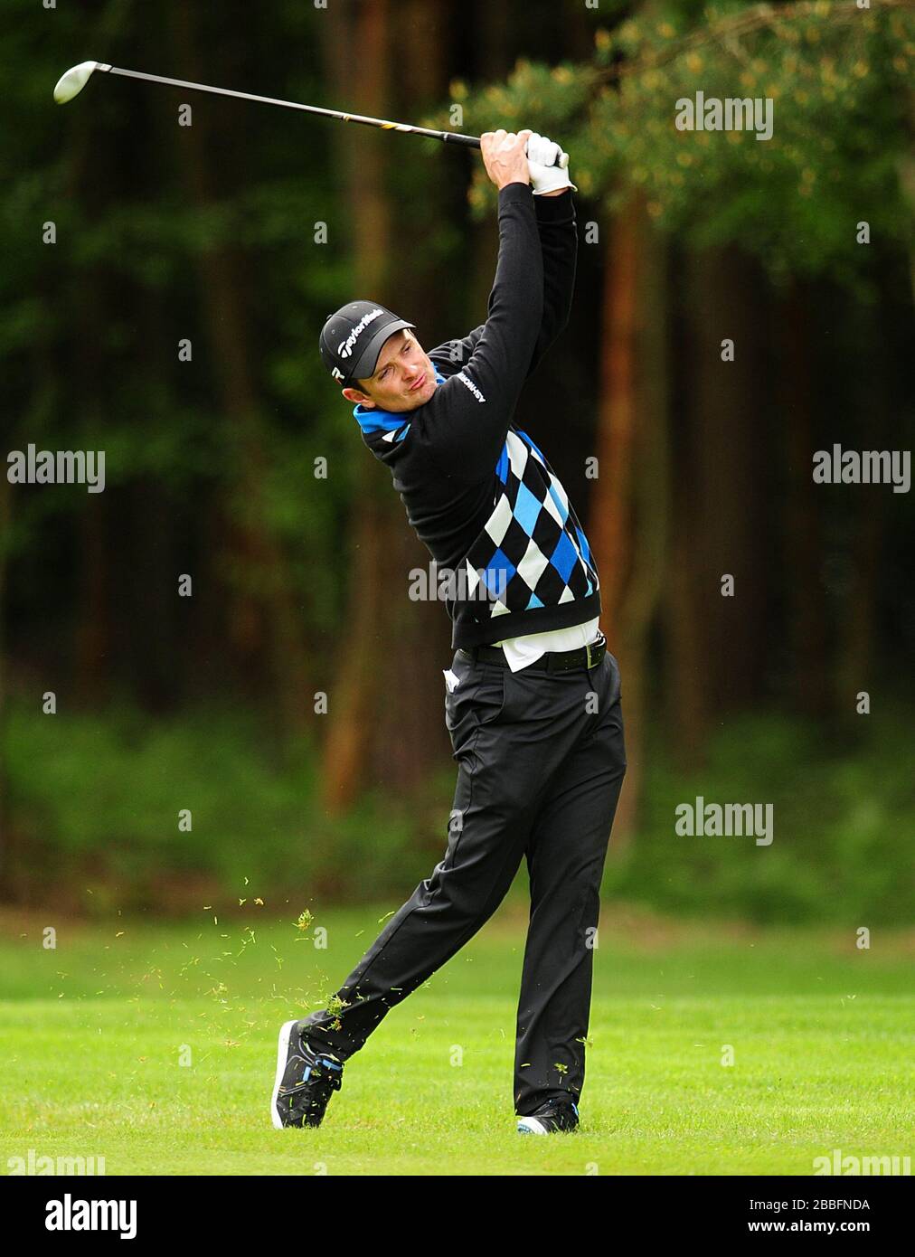 Justin Rose dell'Inghilterra durante il primo giorno del campionato PGA BMW 2013, al Wentworth Golf Club. Foto Stock