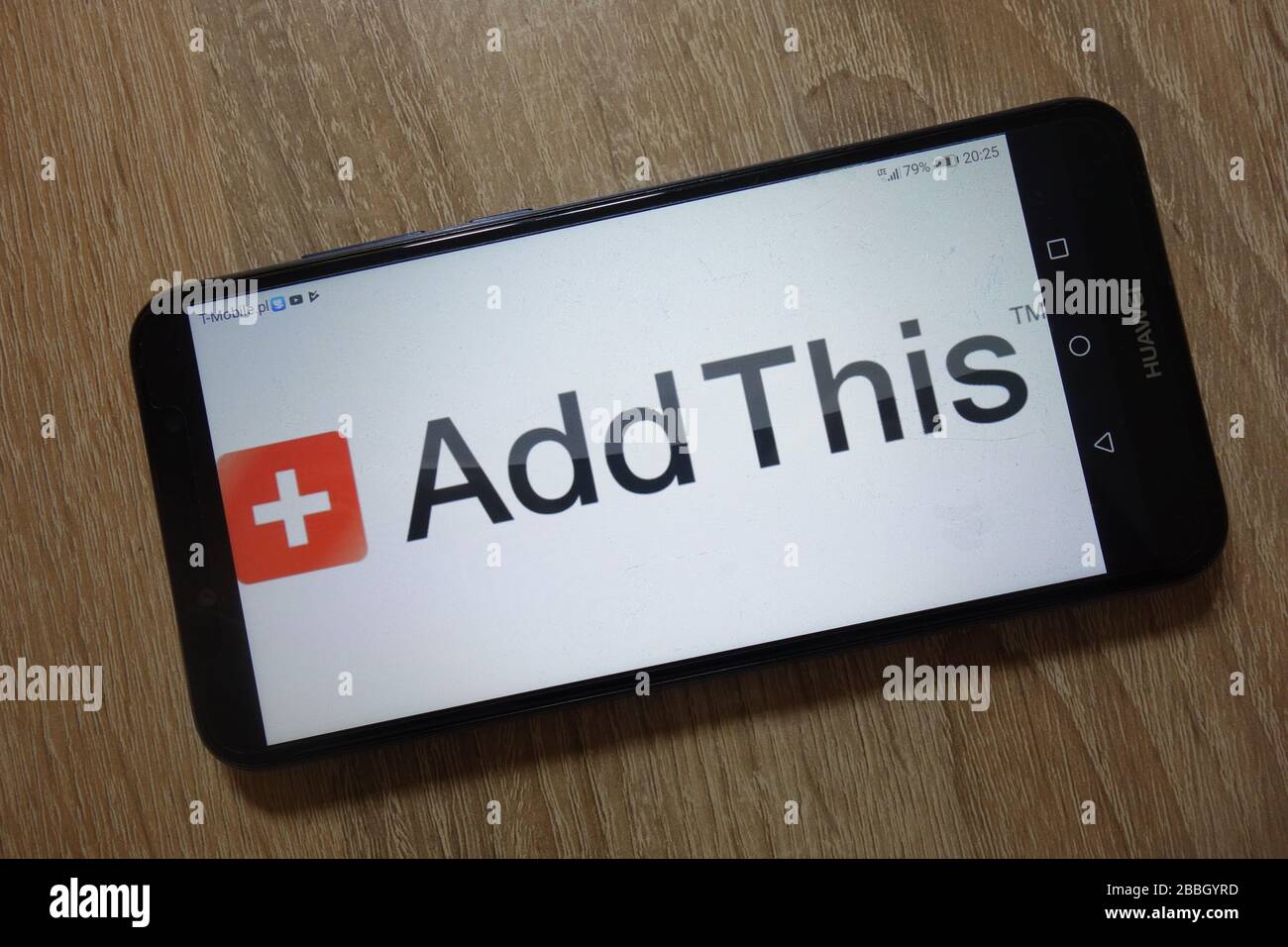 AddQuesto logo viene visualizzato sullo smartphone Foto Stock