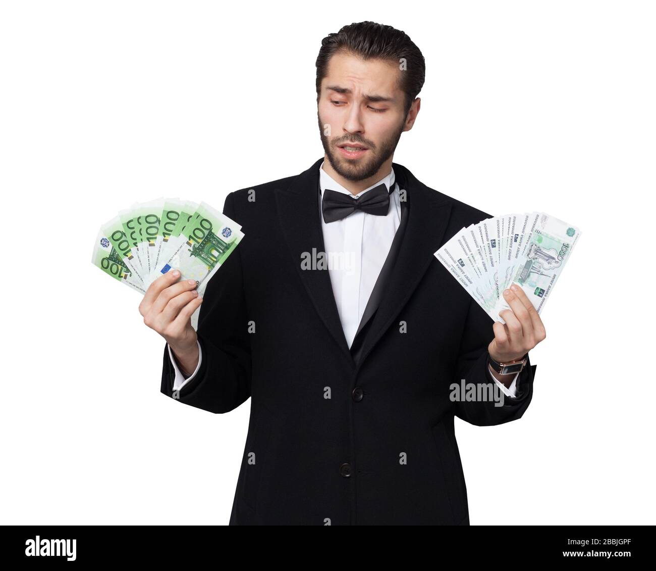 Squalo del capitalismo. Giovane uomo d'affari che gode di euro soldi Foto Stock