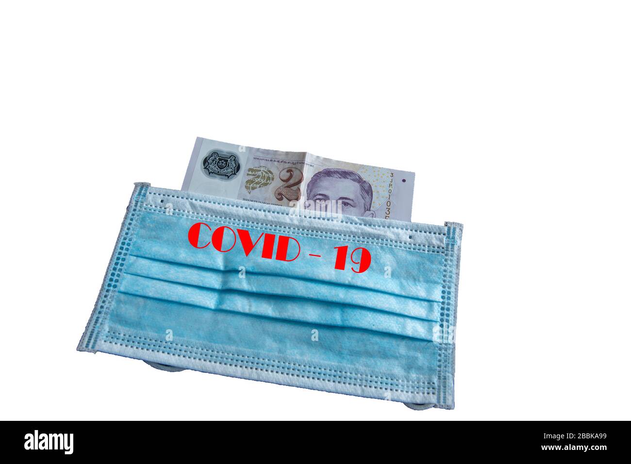 Note bancarie sotto maschera facciale - simbolo della pandemia globale del virus corona sull'economia Foto Stock