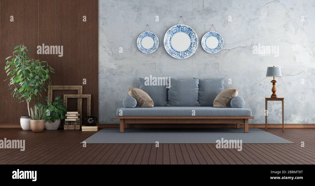 Soggiorno retro con divano blu contro muro vecchio e pannelli in legno -3d rendering Foto Stock