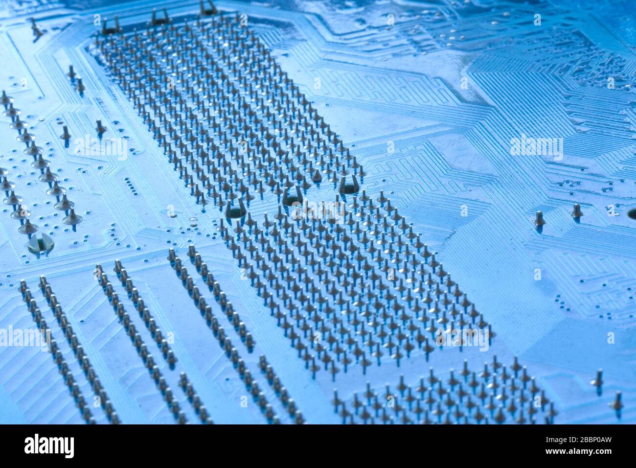 Scheda elettronica blu di uno sfondo di primo piano di un dispositivo elettronico Foto Stock