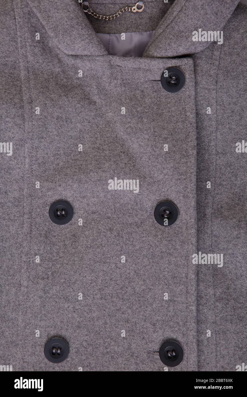 Il cappotto è una forma elegante di una giacca lunga utilizzata principalmente in inverno o in altre giornate fredde. Foto Stock