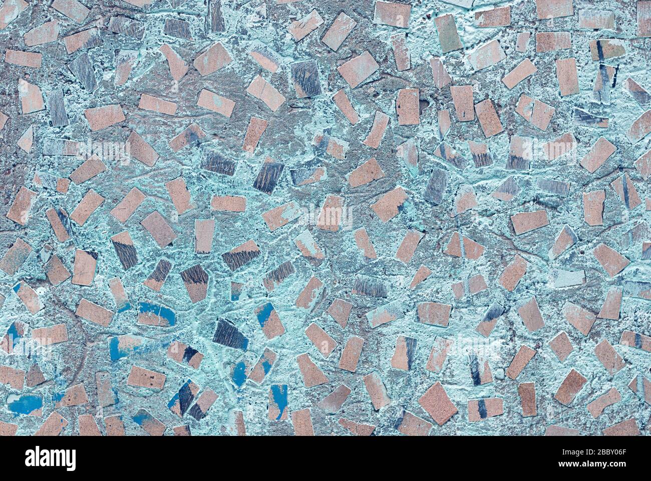 trama astratta di muro di cemento con motivo a mosaico casuale Foto Stock