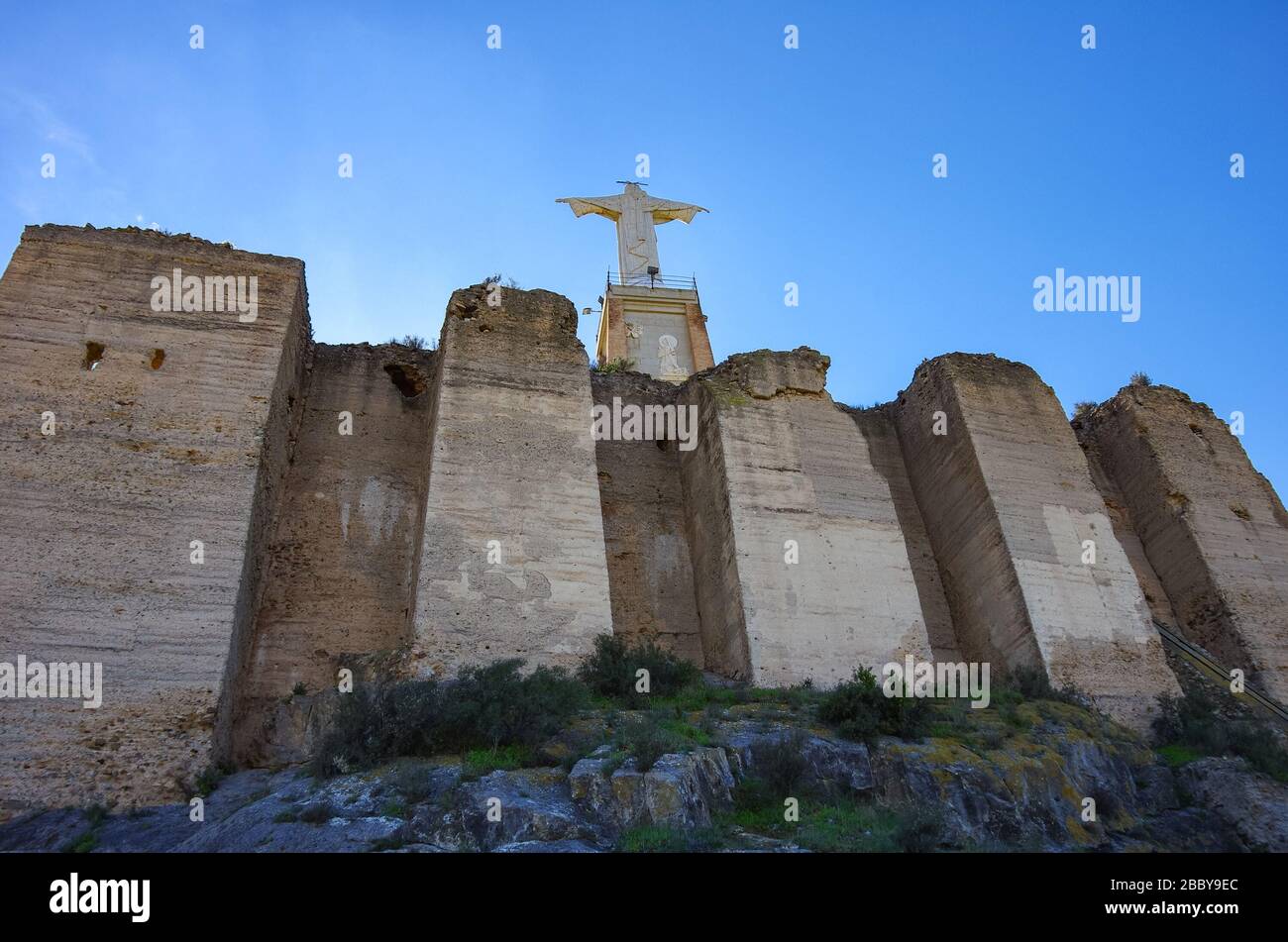 Statua cristo. Castillo de Monteagudo, castello medievale, Murcia, Spagna. Foto Stock