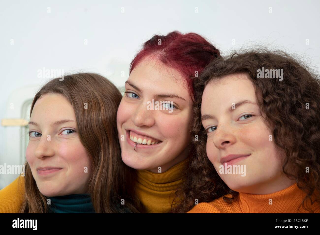 Ritratto di tre sorelle felici Foto Stock