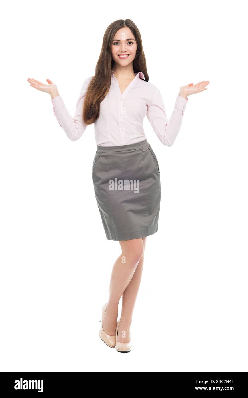 Giovane donna d'affari in piedi su sfondo bianco Foto Stock