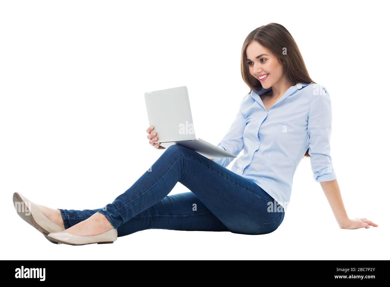 Donna seduta con notebook Foto Stock