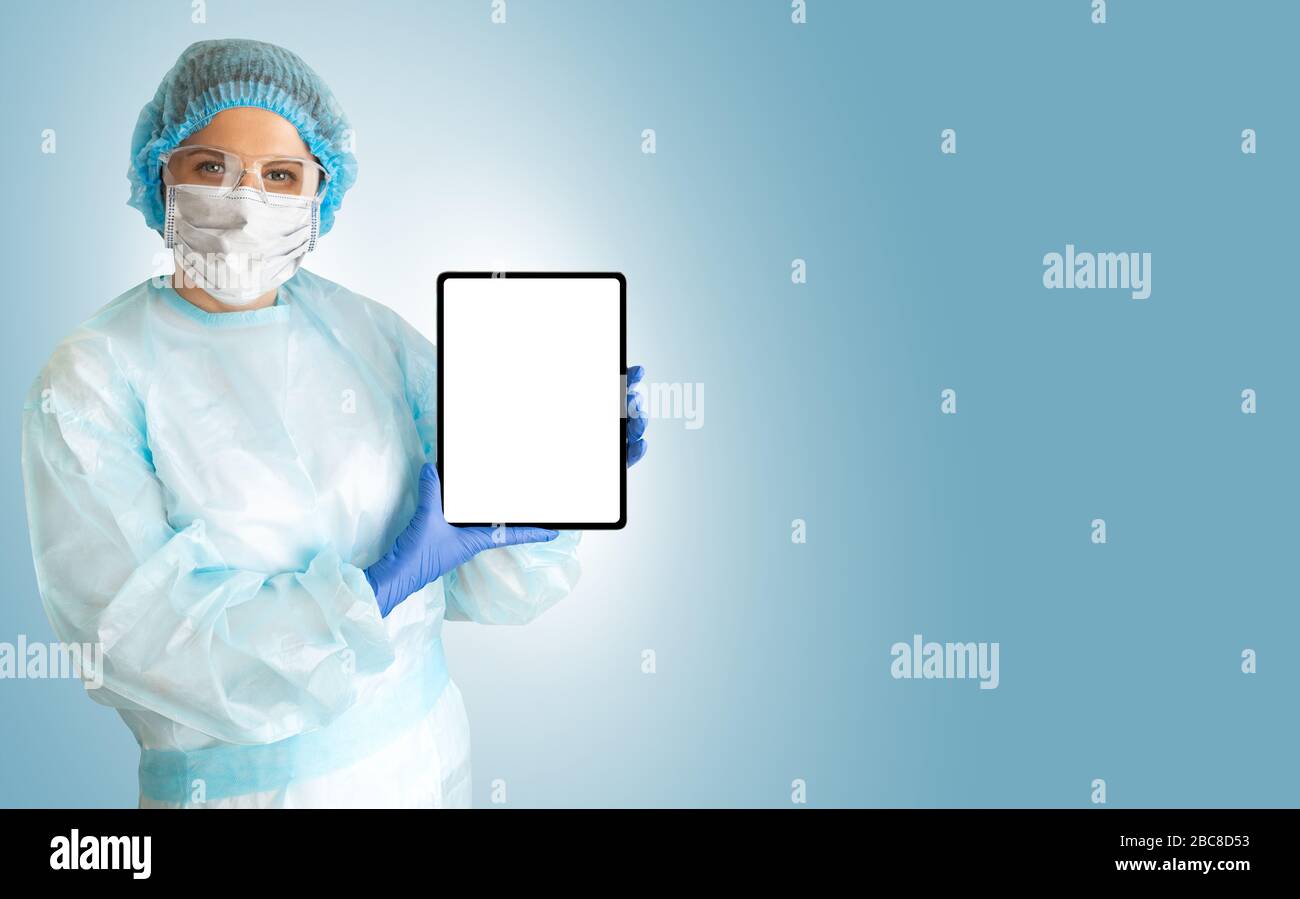 Medico con un tablet digitale Foto Stock