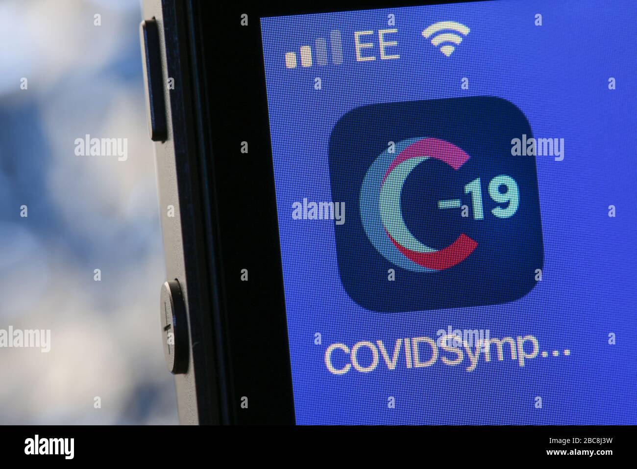 App di localizzazione di Cosid sympton su un iPhone nel Regno Unito. Foto Stock