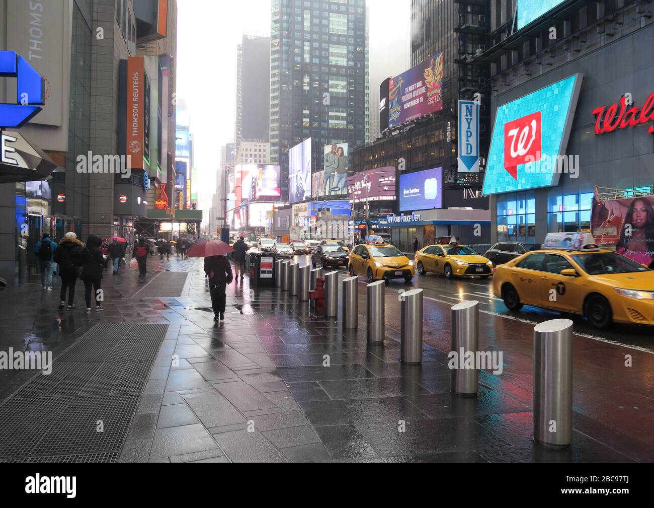 Times Square sotto la pioggia Foto Stock