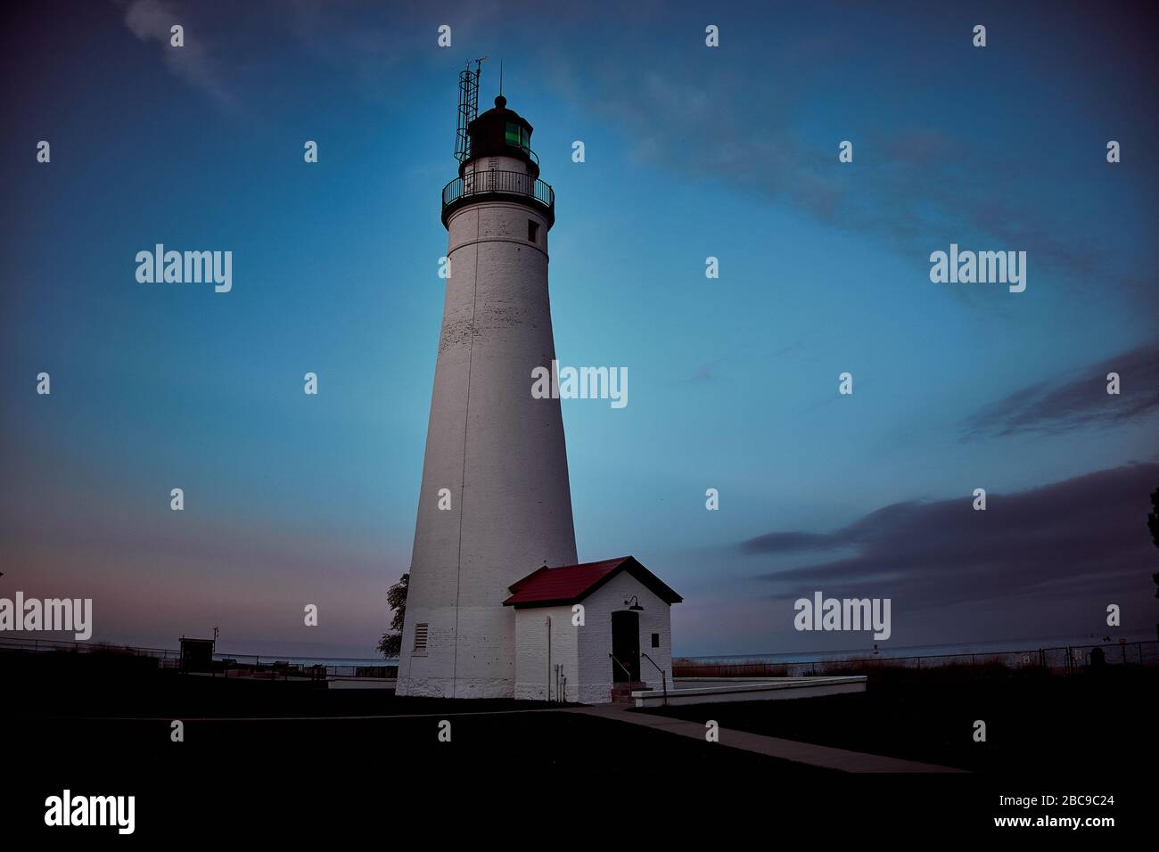 Foto al tramonto di Fort Gratiot luce casa a Port Huron Michigan Foto Stock