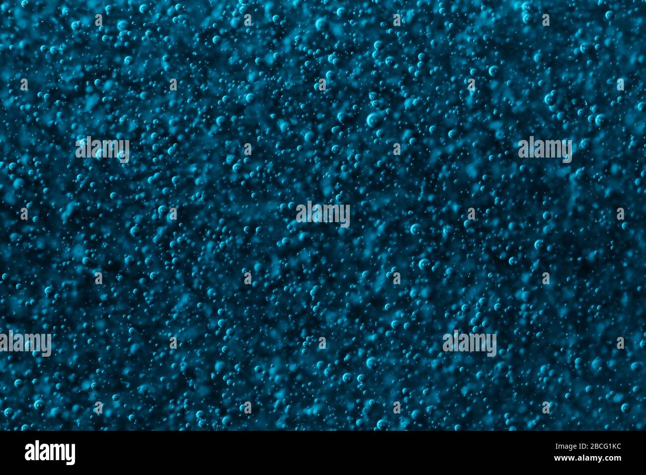 Festive blu scintillante bolle sfondo Foto Stock