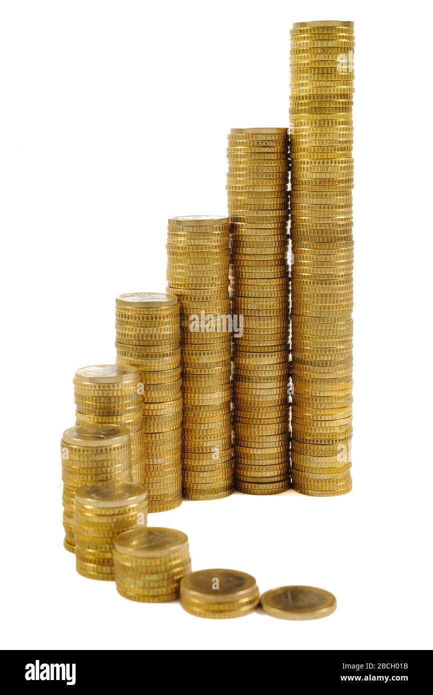 Le monete in euro impilate mostrano il successo con il grafico Foto Stock