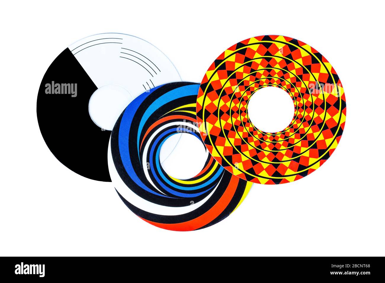 Illusioni ottiche forme astratte, tre tagli colorati cerchio oggetti, elementi, rotazione vagone-ruota effetto illusorico. Percezione visiva falsa Foto Stock