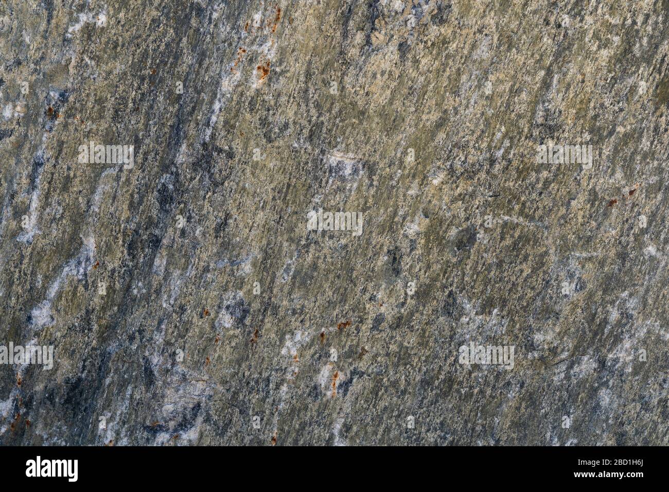 Struttura di roccia naturale granito roccia naturale granito, struttura magmatica con quarzo e mica e tracce di erosione e ossido. Foto Stock