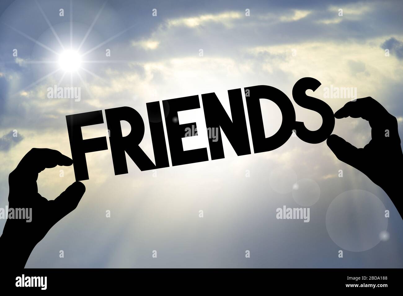 Concetto amici - mani, testo, cielo Foto Stock