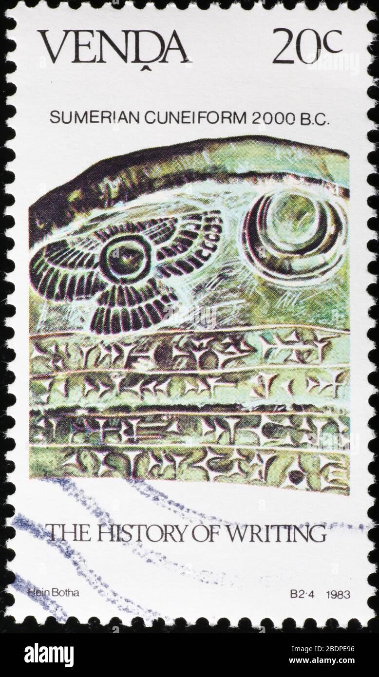 Alfabeto cuneiforme sumeriano su francobollo Foto Stock