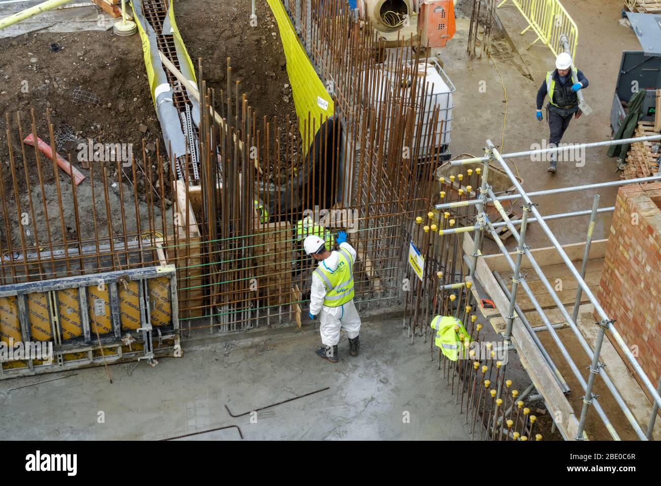 Lavoratori in cantiere a Stratford, Londra Inghilterra Regno Unito Foto Stock