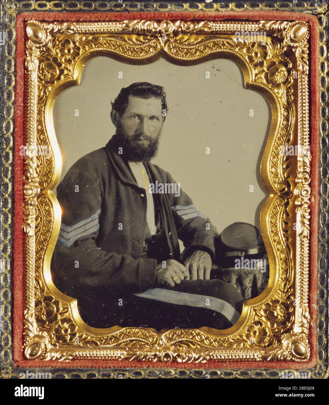 Ritratto di un soldato confederato del 1862 circa. Ambrogype, colorato a mano. Guerra civile americana. Foto Stock