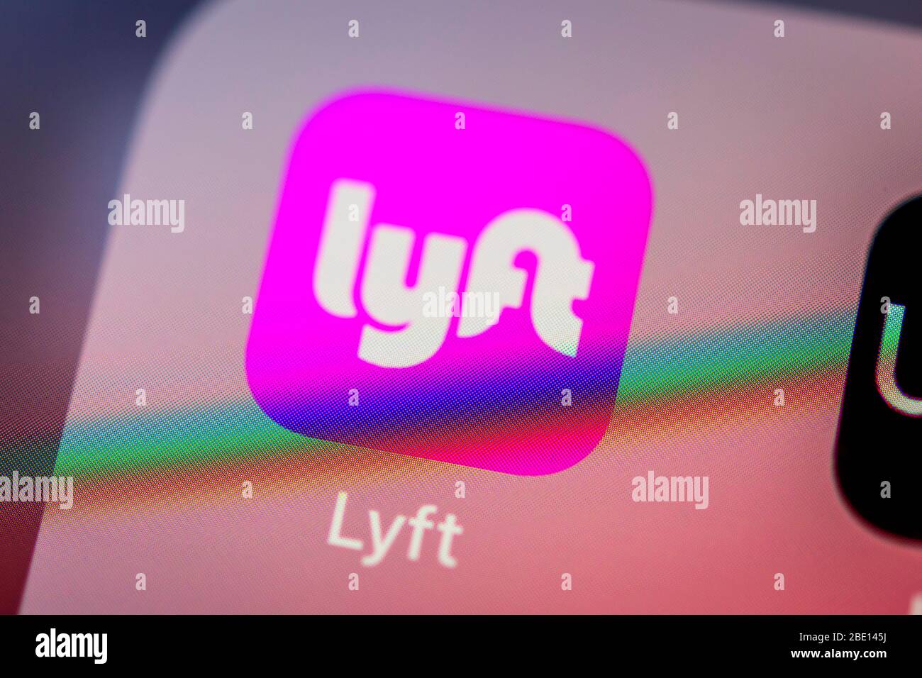 App Lyft, servizio taxi, icona, logo, display, iPhone, telefono cellulare, smartphone, iOS, foto macro, dettaglio, formato completo Foto Stock