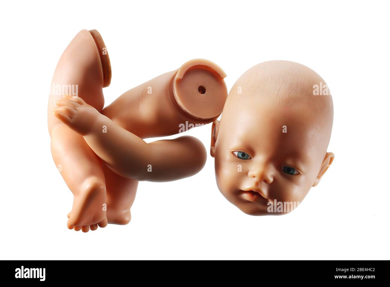 Broken Doll su sfondo di legno Foto Stock