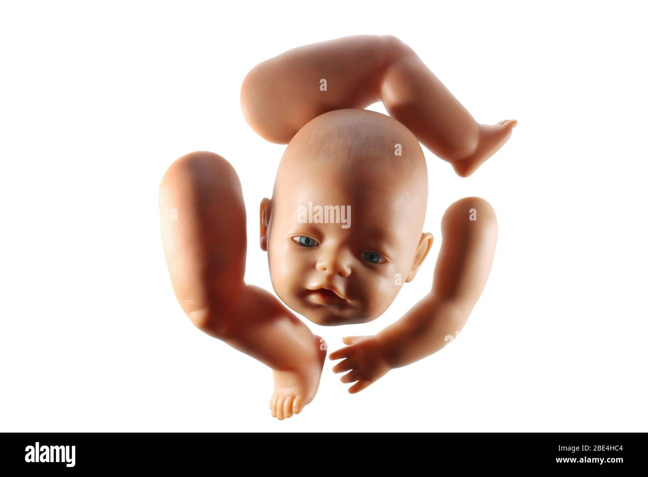 Broken Doll su sfondo di legno Foto Stock