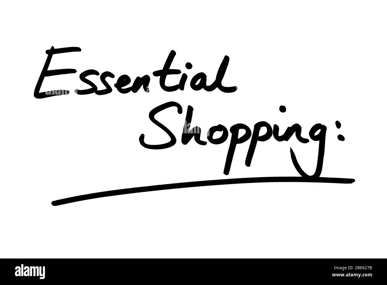 Titolo essenziale Shopping scritto a mano su sfondo bianco. Foto Stock