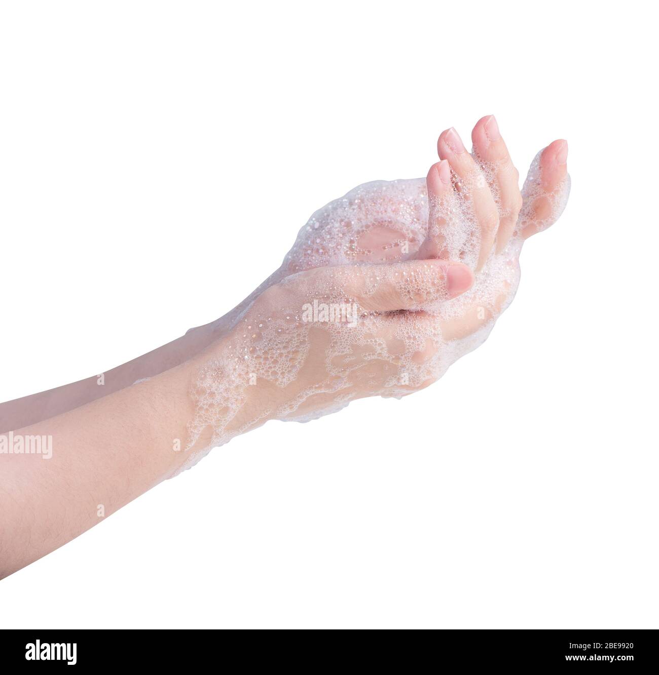 Mani di lavaggio isolate su sfondo bianco. Giovane donna asiatica che usa sapone liquido per lavare le mani, concetto di protezione del coronavirus pandemico, primo piano. Foto Stock